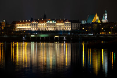 Reflection of illuminated buildings in water