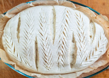 High angle view of coffee beans on wood