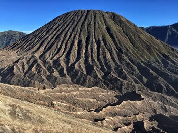 View of volcanic mountain against sky