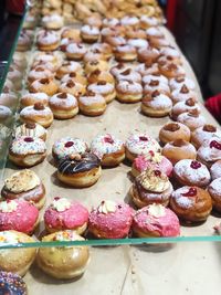 High angle view of donuts for sale at market stall