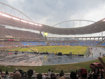 Crowd at maracana stadium during soccer match against sky