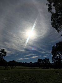 Scenic view of field against sky at night