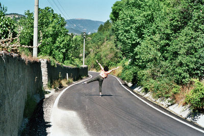 Happy woman on the road