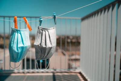 Close-up of clothes hanging on clothesline