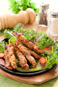 Close-up of food served on table