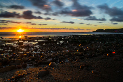 Scenic view of sea against sky during sunset