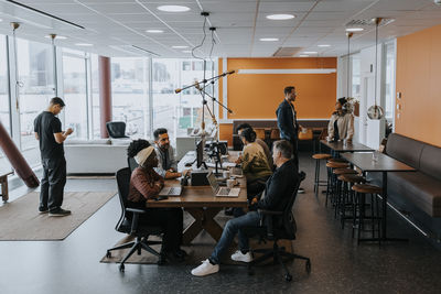 Multiracial business colleagues working in corporate office