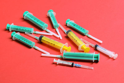 Close-up of felt tip pens on yellow background