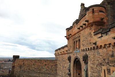 Low angle view of old building against sky