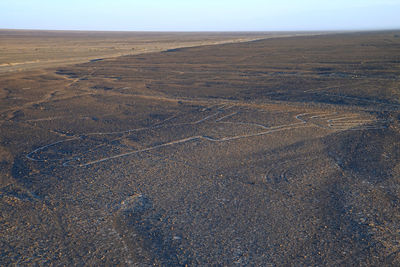 Nazca lines called los manos hands as seen from top of the viewing platform in nazca desert of peru