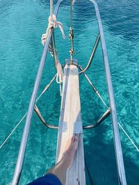 High angle view of sailboat sailing on sea