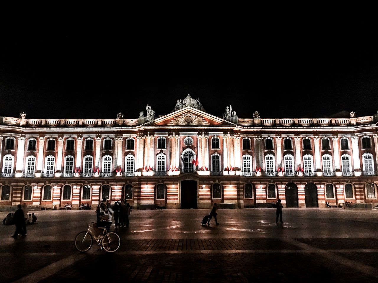 ILLUMINATED BUILDING AT NIGHT