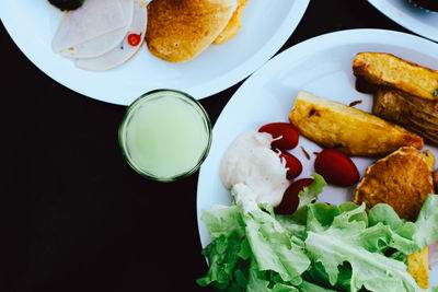 High angle view of breakfast served on table