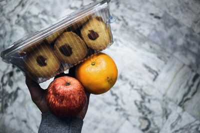 Close-up of hand holding food