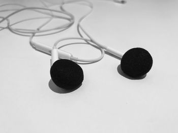 High angle view of black coffee on white background