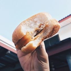 Close-up of hand holding bread