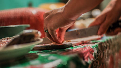 Close-up of person preparing food