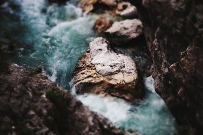 Close-up of rock formation in water