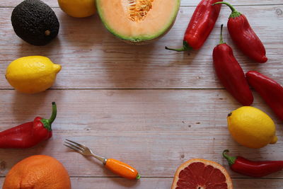 High angle view of oranges on cutting board