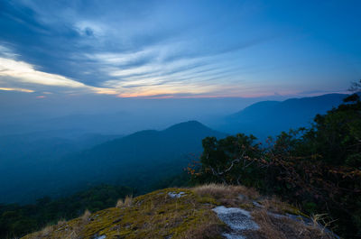 Scenic view of mountains against sky during sunset