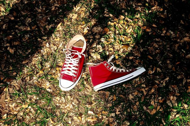 High angle view of shoes on field | ID: 107834686