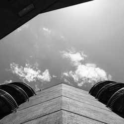 Low angle view of building against cloudy sky