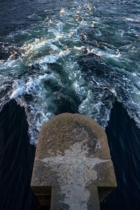 High angle view of rocks in sea