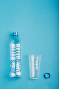 View of plastic bottles on blue background