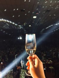 Close-up of hand holding wine glass