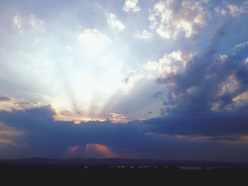 Scenic view of landscape against sky at sunset