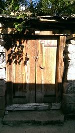 Closed wooden door of house