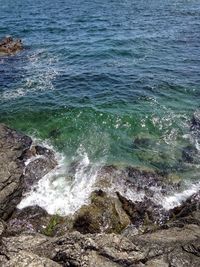 Waves splashing on rocks