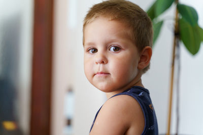 Portrait of cute boy at home