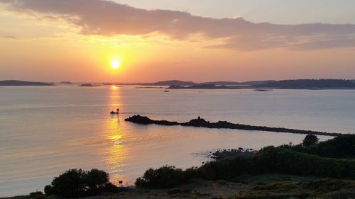 Scenic view of sea against sky during sunset