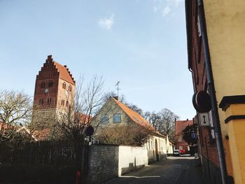 View of residential buildings against sky