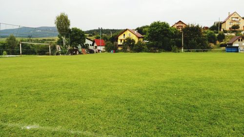 House on grassy field