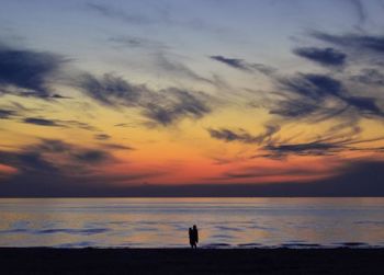 Scenic view of sea at sunset