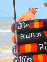 Close-up of text on the beach