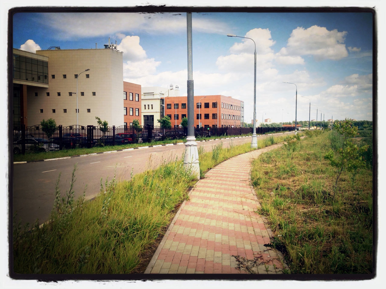 transfer print, architecture, building exterior, built structure, sky, the way forward, cloud - sky, auto post production filter, grass, cloud, diminishing perspective, footpath, vanishing point, cloudy, walkway, empty, house, plant, day, pathway