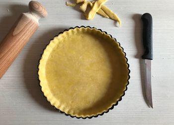 High angle view of bread on cutting board