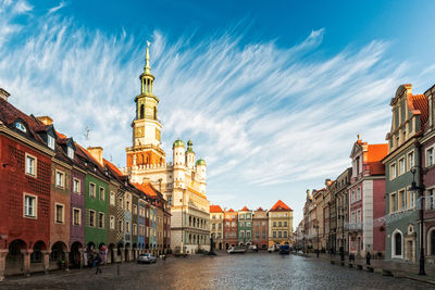 Road amidst buildings in city