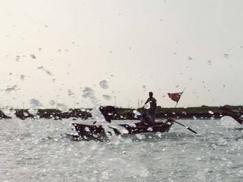 Woman standing in water