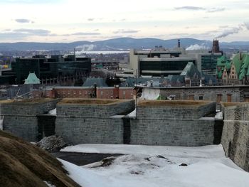 Buildings in city during winter