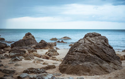Scenic view of sea against cloudy sky