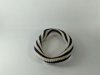 High angle view of spiral tied up on table