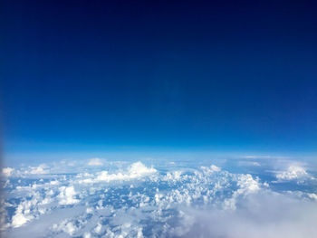 Aerial view of clouds over blue sky
