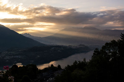 Scenic view of mountains against sky during sunset