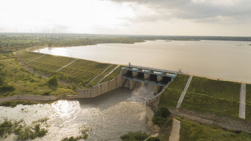 High angle view of dam on river against sky