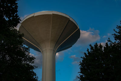 Low angle view of water tower against sky