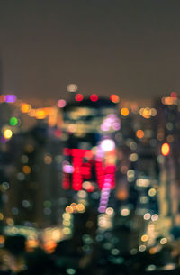 Defocused image of illuminated lights at night